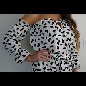 Black and white romper brand new. Sizes S and M